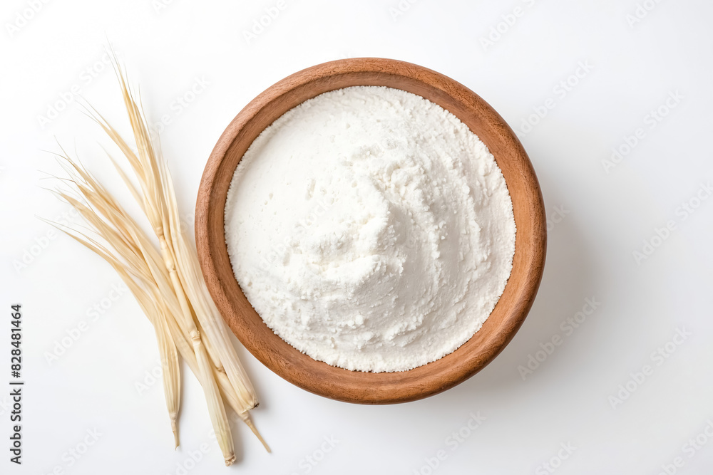 Flour in a wooden bowl with dried grass Flour in a wooden bowl with dried grass