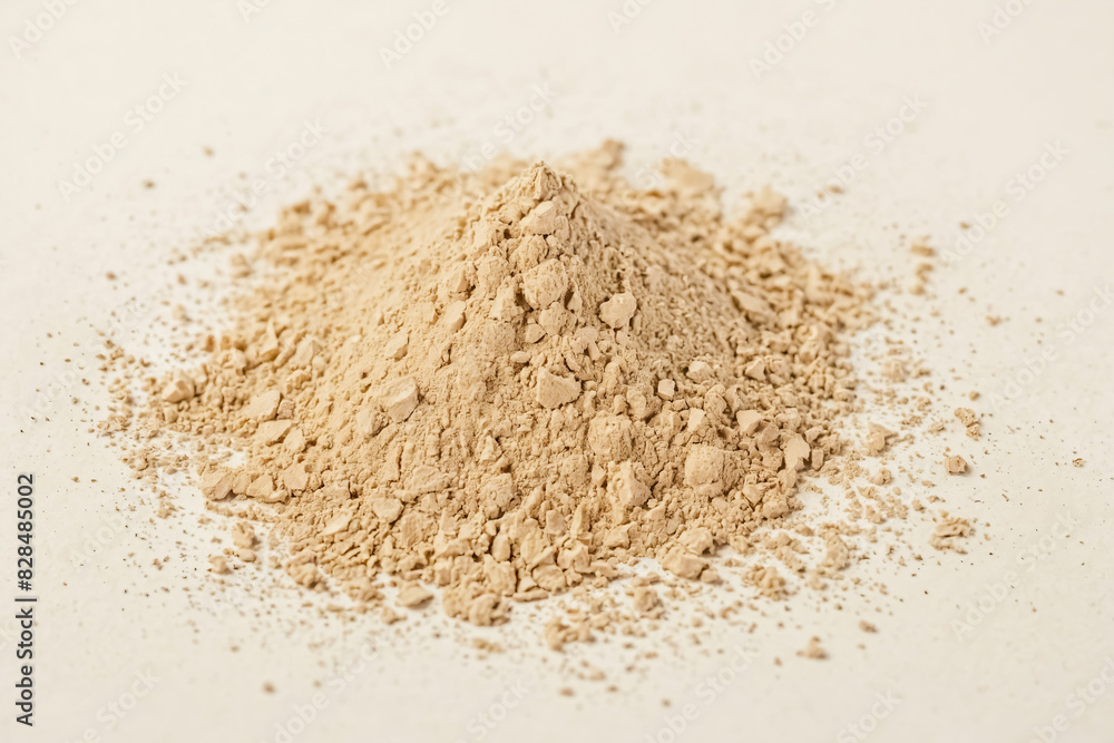 Beige powder pile isolated on white background Beige powder pile isolated on white background