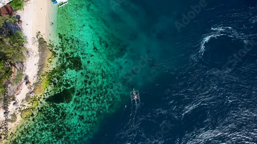 4K Aerial Drone video of unique place of different sea water currents meeting at the south tip of the Cebu island, Liloan, Philippines photo