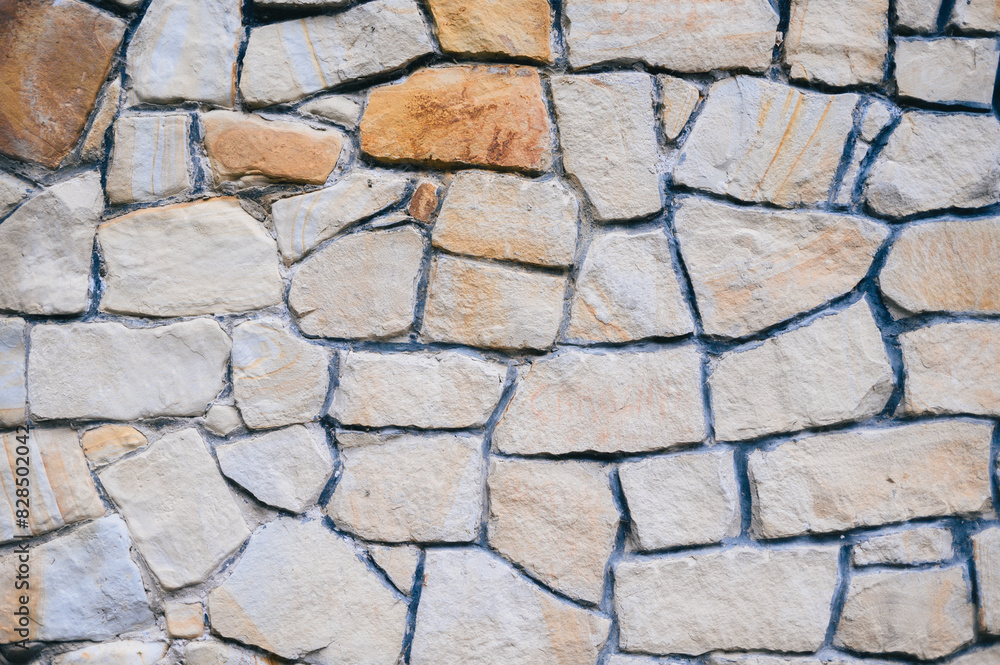 Various sized stones form a wall Various sized stones form a wall