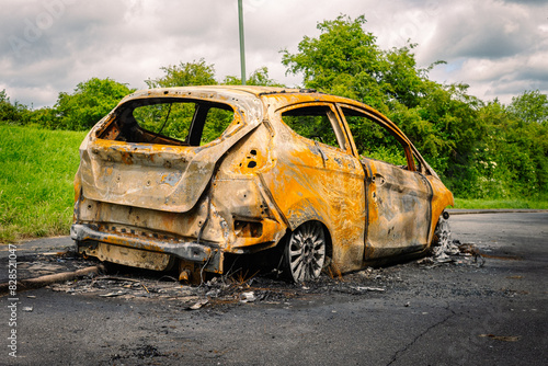 rear view of burnt out car on a British cycle track