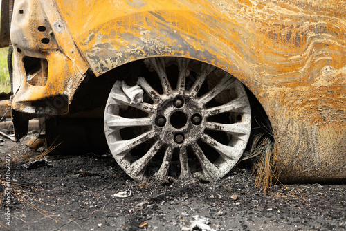 wheel of a car that has been burnt out 