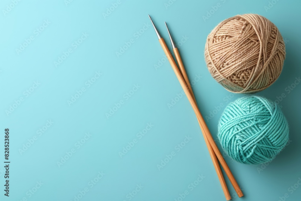 Balls of thread with needles is on blue background Balls of thread with needles is on blue background