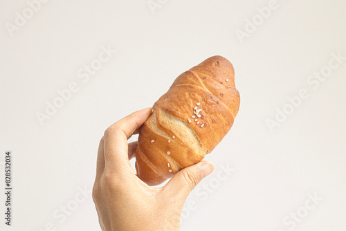 Salted bread on white background.