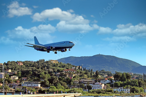 Airplane landing at Kerkyra Airport, Corfu International Airport. Corfu island, Greece