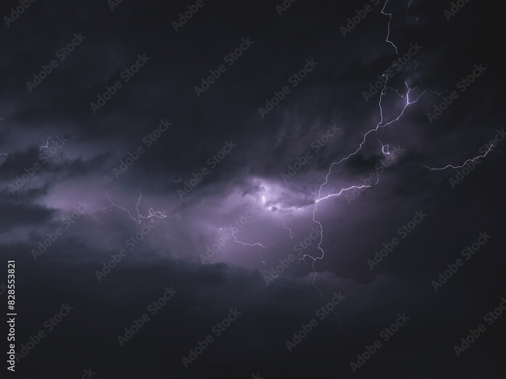 lightning strikes across a dark, cloudy night sky as it moves towards the camera lightning strikes across a dark, cloudy night sky as it moves towards the camera