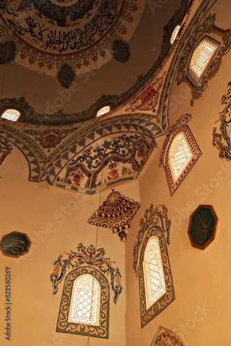 Elaborate ceiling and wall painting, fresco, decoration, pattern, ornament inside the Sinan Pasha Mosque, an ottoman mosque in the old town of Prizren, Kosovo photo