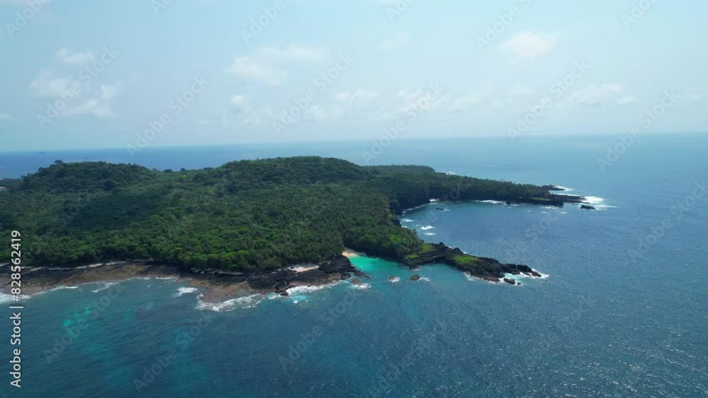 Drone shot of an island on a sunny day. Drone shot of an island on a sunny day.