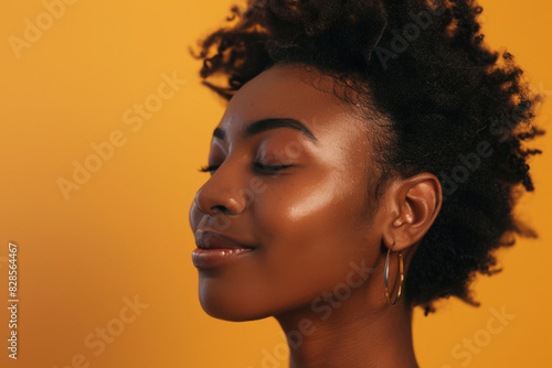 Wallpaper Mural A close up of a black woman's face with her eyes closed looking to a side Torontodigital.ca