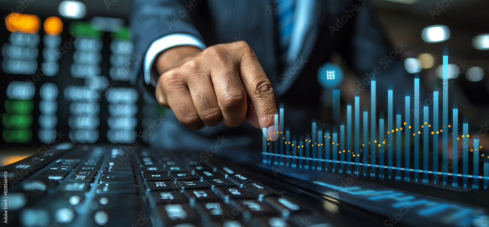 Fototapeta premium A hand picking or pointing on a graph infographic, business growthing concept, presentation of growthing business,