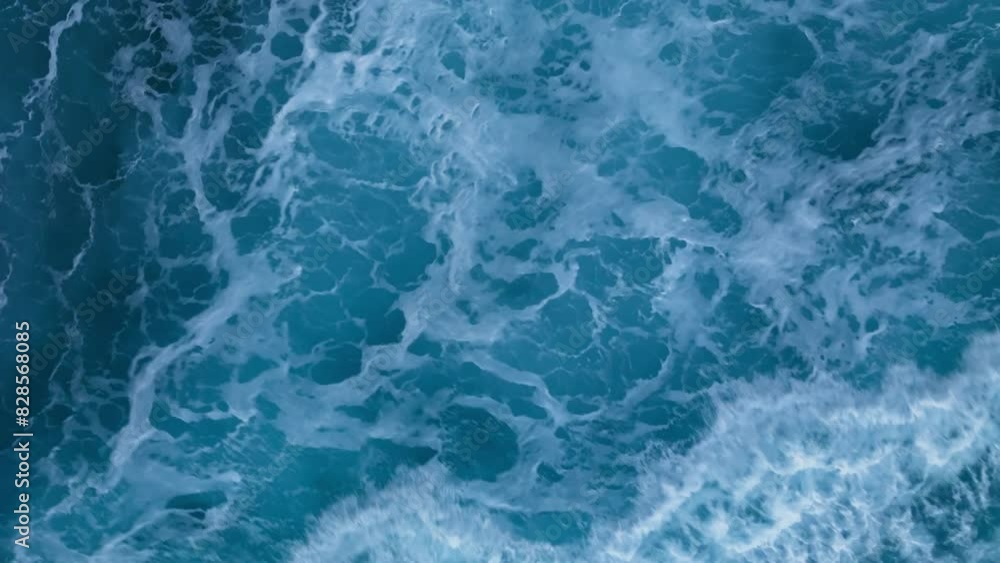 Foam on Atlantic Ocean deep blue water waves aerial top down view, Powerful storm on the sea Foam on Atlantic Ocean deep blue water waves aerial top down view, Powerful storm on the sea
