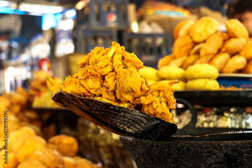 Popular street food item mix bhajiya snacks or Pakoda or Pakora Alu bhajiya photo