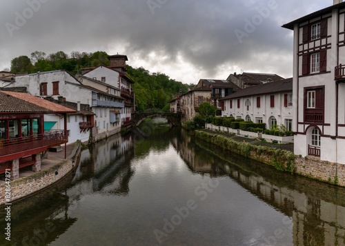 view of the old town of Saint-Jean-Pied-de-Port with the stone bridge over the Nive River