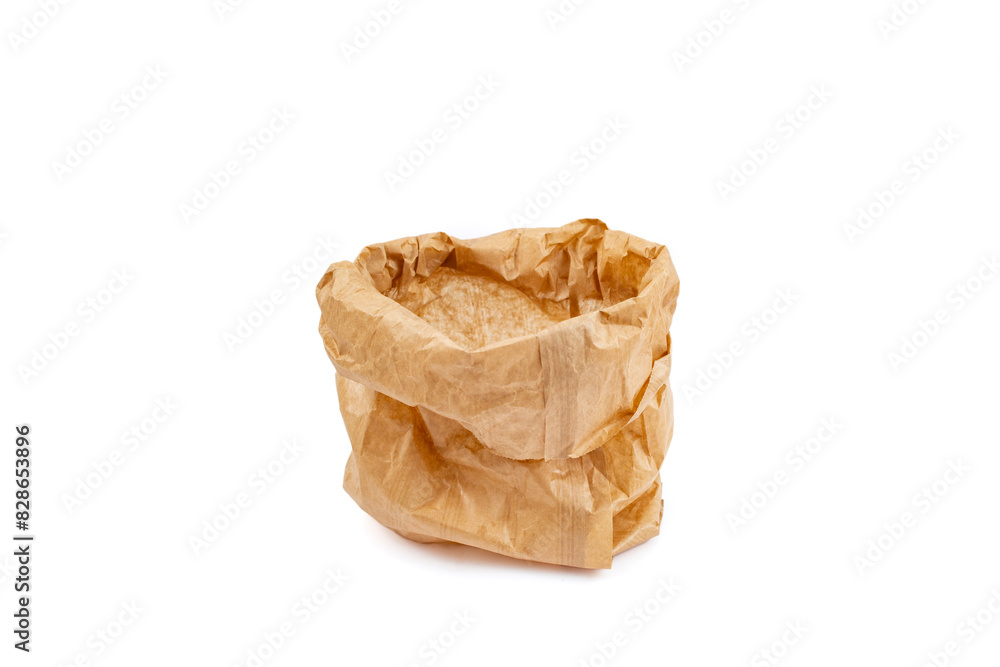 Folded and wrinkled paper bag isolated on white background, abstract backdrop Folded and wrinkled paper bag isolated on white background, abstract backdrop