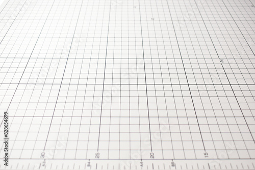 gray cutting mat board background with line and scale measure guide pattern for object art design  tool equipment of diy craft work