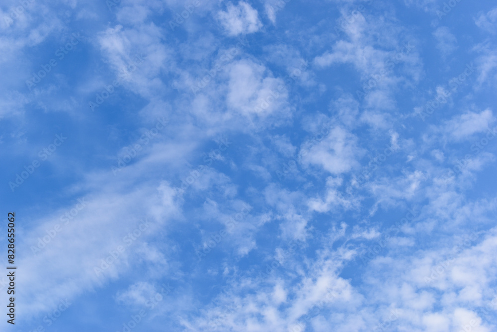 beautiful blue sky and white fluffy group of clouds with sunrise in the morning, natural background beautiful blue sky and white fluffy group of clouds with sunrise in the morning, natural background