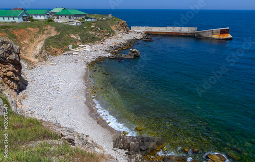 Snake Island, view of the Ladies' Beach with a washed-out skewed pier, Ukraine