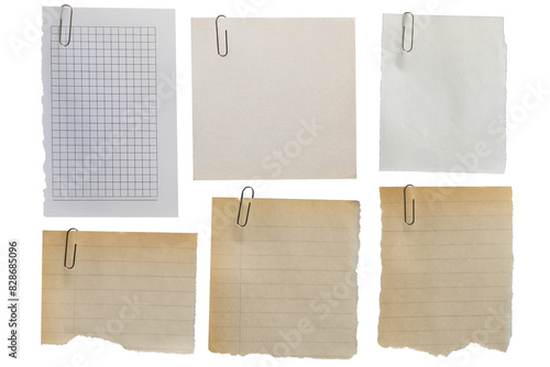 Set of old scraps of different types of paper with torn edges fixed with a paper clip on a transparent background.