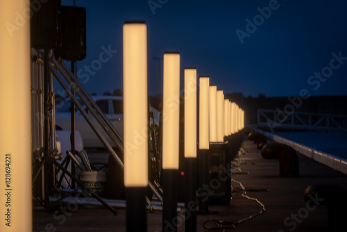 Light followed by a column standing by the sea.