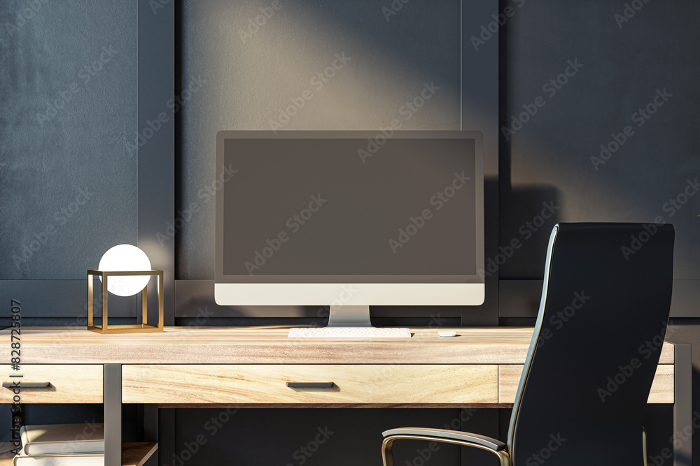 Modern desktop computer on a wooden desk with a lamp, in front of a dark wall, concept of a workspace. 3D Rendering