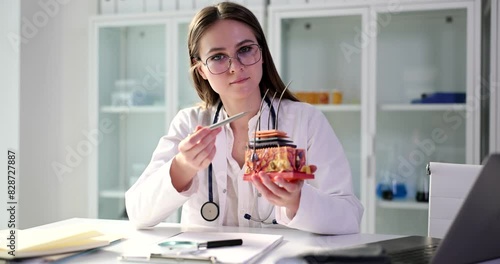 Plastic model of structure of skin with hair for training in hands of cosmetologist. Structure and anatomy of skin