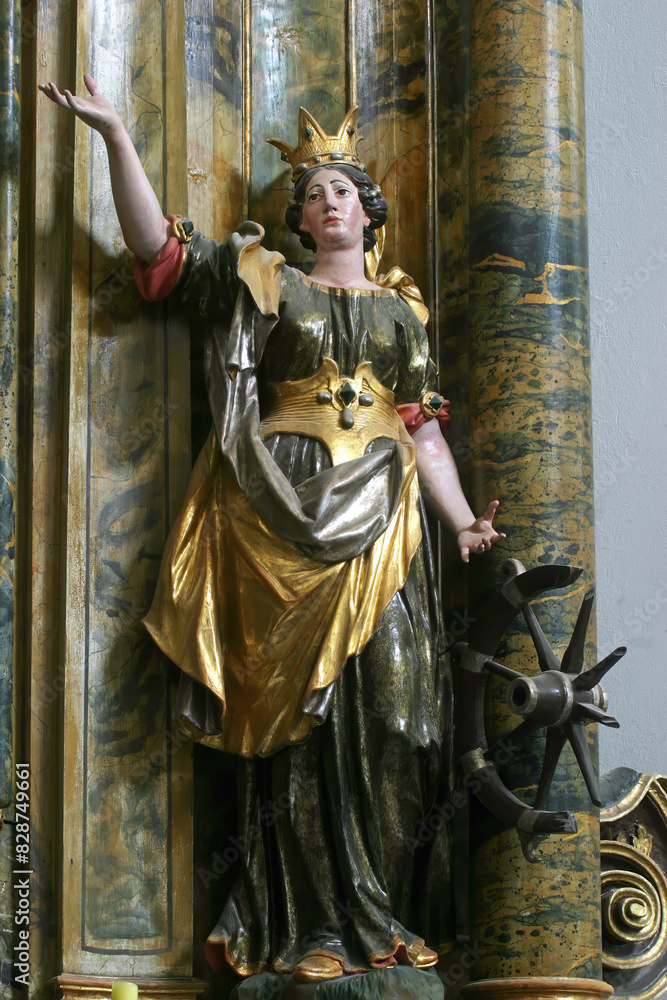 Obraz premium Statue of Saint Catherine of Alexandria on the Saint Mary altar in the church of Saint Leonard of Noblac in Kotari, Croatia