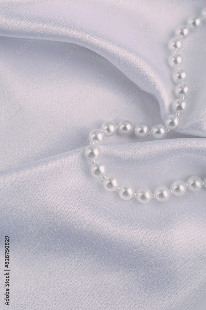 White pearls on white silk White pearls on white silk