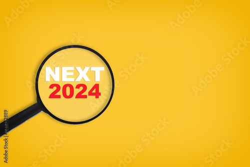 Next 2024 wrtiien on yellow paper with magnifying glass. Searching opportunity concept and sustainable future idea