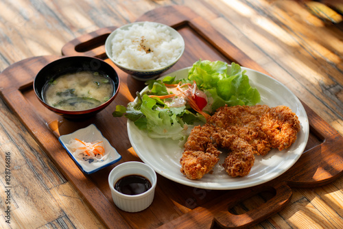 Tonkutsu set serve on wood plate.