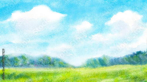 Watercolor illustration of green grass and blue sky hand drawn abstract nature background