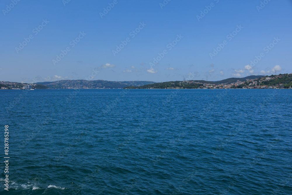 Turquoise blue sea water. View of the Bosphorus in Istanbul city on sunny summer day, in a public place. Turquoise blue sea water. View of the Bosphorus in Istanbul city on sunny summer day, in a public place.