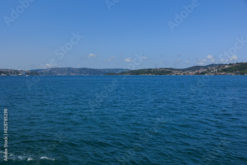 Turquoise blue sea water. View of the Bosphorus in Istanbul city on sunny summer day, in a public place. © Tatiana