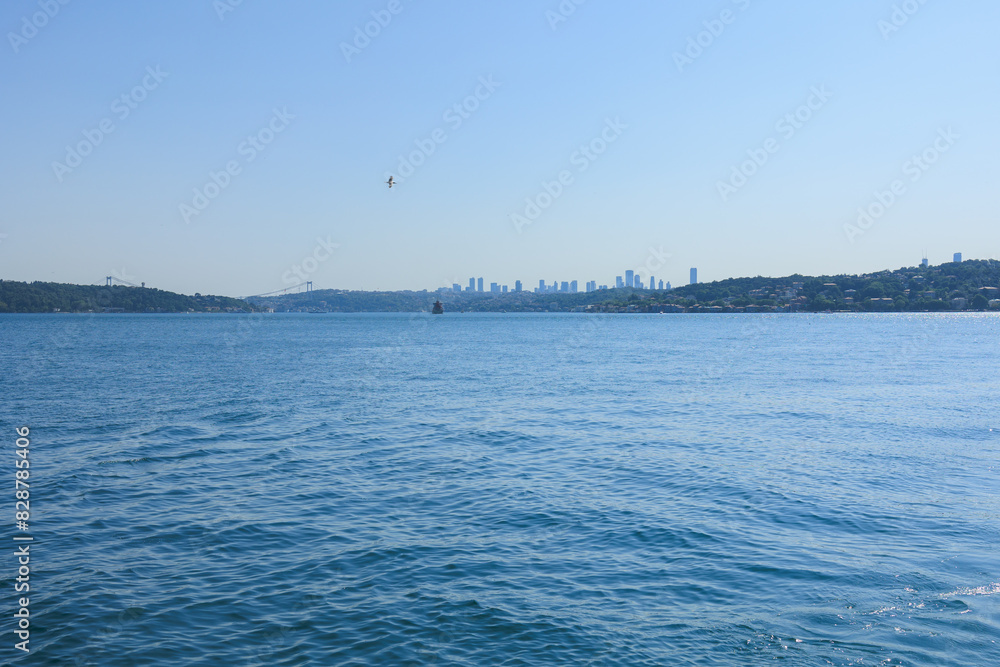 Turquoise blue sea water. View of the Bosphorus in Istanbul city on sunny summer day, in a public place. Turquoise blue sea water. View of the Bosphorus in Istanbul city on sunny summer day, in a public place.