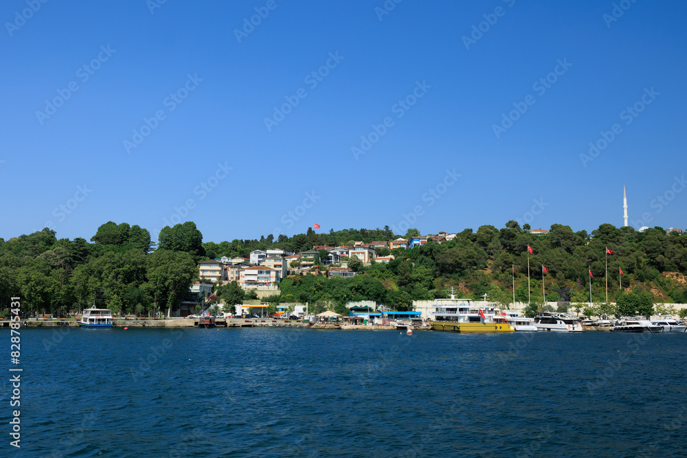 Turquoise blue sea water. View of the Bosphorus in Istanbul city on sunny summer day, in a public place. Turquoise blue sea water. View of the Bosphorus in Istanbul city on sunny summer day, in a public place.