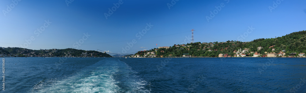 Turquoise blue sea water. View of the Bosphorus in Istanbul city on sunny summer day, in a public place.