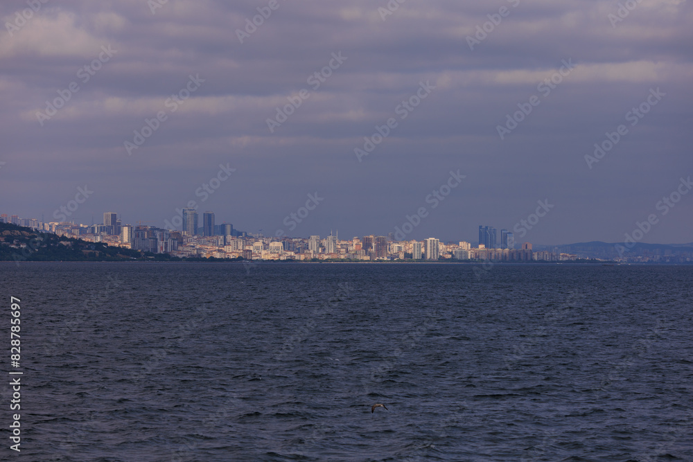 Turquoise blue sea water. View of the Bosphorus in Istanbul city on sunny summer day, in a public place. Turquoise blue sea water. View of the Bosphorus in Istanbul city on sunny summer day, in a public place.