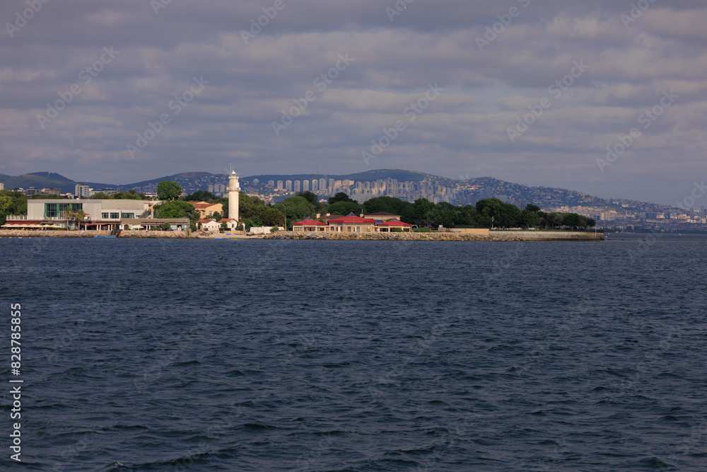 Turquoise blue sea water. View of the Bosphorus in Istanbul city on sunny summer day, in a public place. Turquoise blue sea water. View of the Bosphorus in Istanbul city on sunny summer day, in a public place.