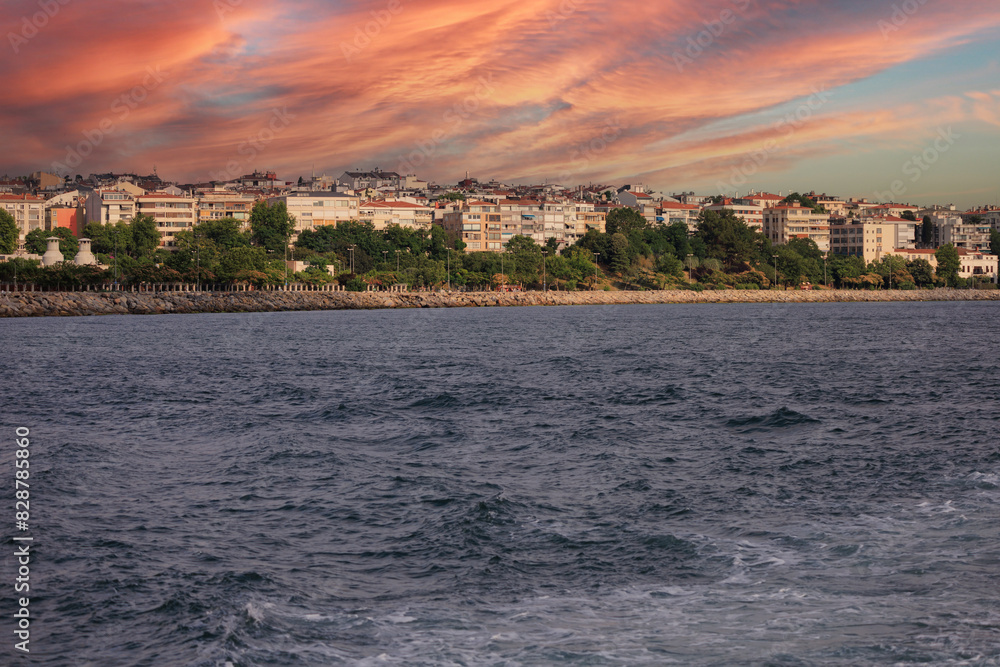 Orange sky at sunset in the evening. Seascape overlooking the coast in the city of Istanbul Orange sky at sunset in the evening. Seascape overlooking the coast in the city of Istanbul