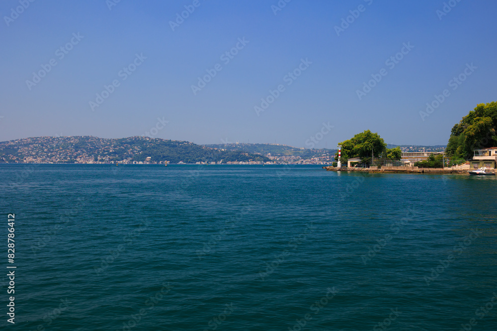 Turquoise blue sea water. View of the Bosphorus in Istanbul city on sunny summer day, in a public place. Turquoise blue sea water. View of the Bosphorus in Istanbul city on sunny summer day, in a public place.
