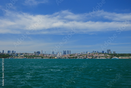 Blue seascape overlooking the coast. View of the Bosphorus in Istanbul city on sunny summer day, in a public place. © Tatiana