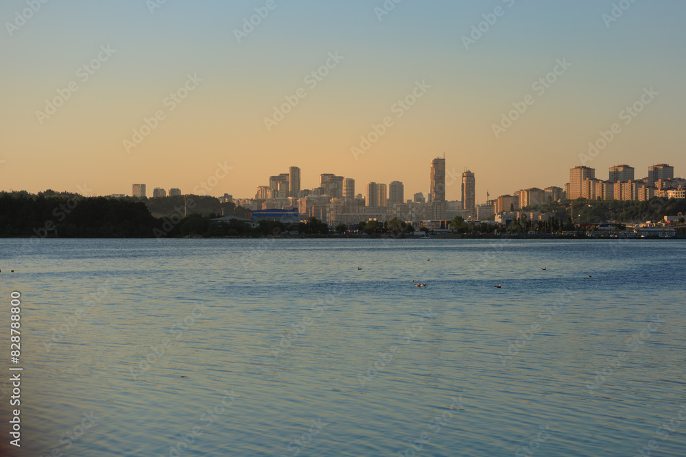 Fototapeta premium Orange sky at sunset in the evening. Seascape overlooking the coast in the city of Istanbul