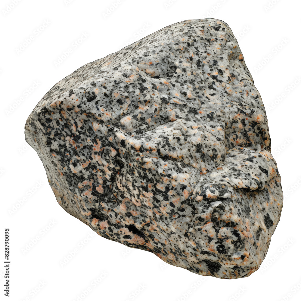 Fototapeta premium A single, gray, speckled rock isolated on a black background.