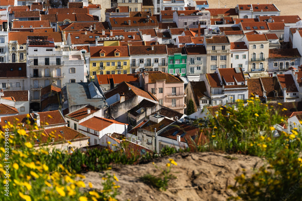 View from the hill to the houses and buildings of 'Praia da Nazaré' beach and city of Nazaré, Portugal View from the hill to the houses and buildings of 'Praia da Nazaré' beach and city of Nazaré, Portugal