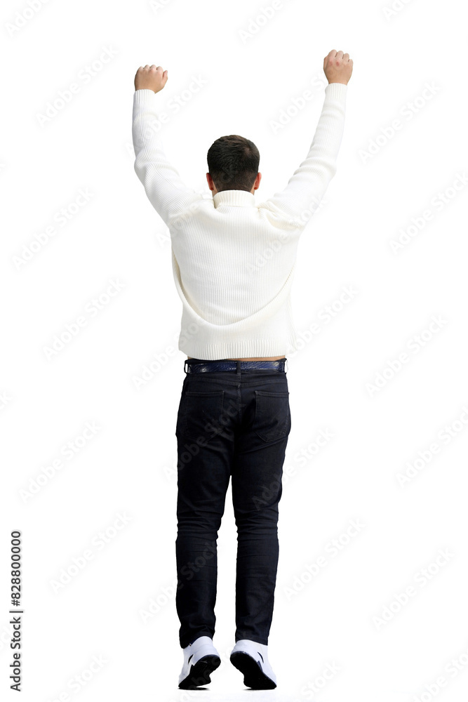 A man, full-length, on a white background, raised his hands up A man, full-length, on a white background, raised his hands up