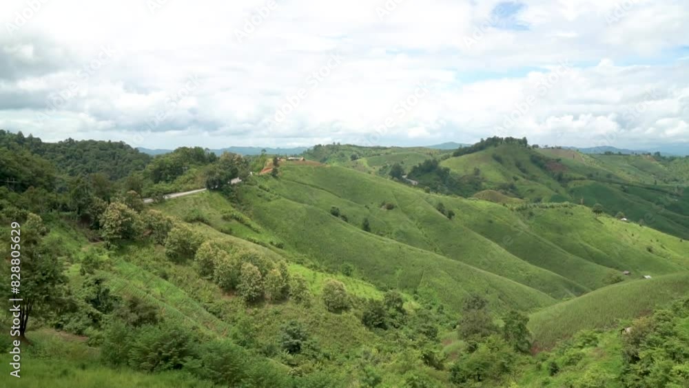 Landscape Scenic Street road with Green Mountain on the hill of mountain Northern Thailand at Nan Thailand - Famous Street in Thai Tourist to take a picture Landscape Scenic Street road with Green Mountain on the hill of mountain Northern Thailand at Nan Thailand - Famous Street in Thai Tourist to take a picture