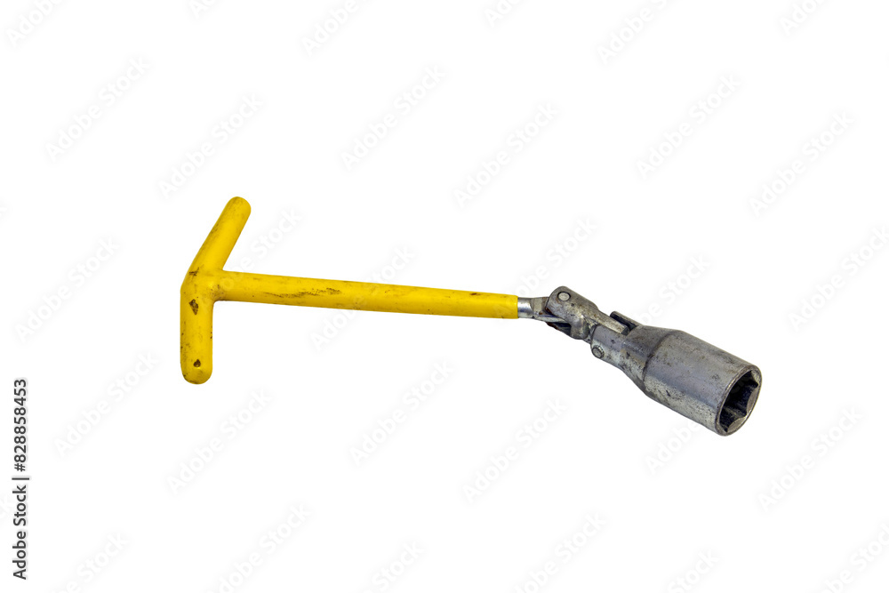 A key for replacing a car candle on a white background A key for replacing a car candle on a white background