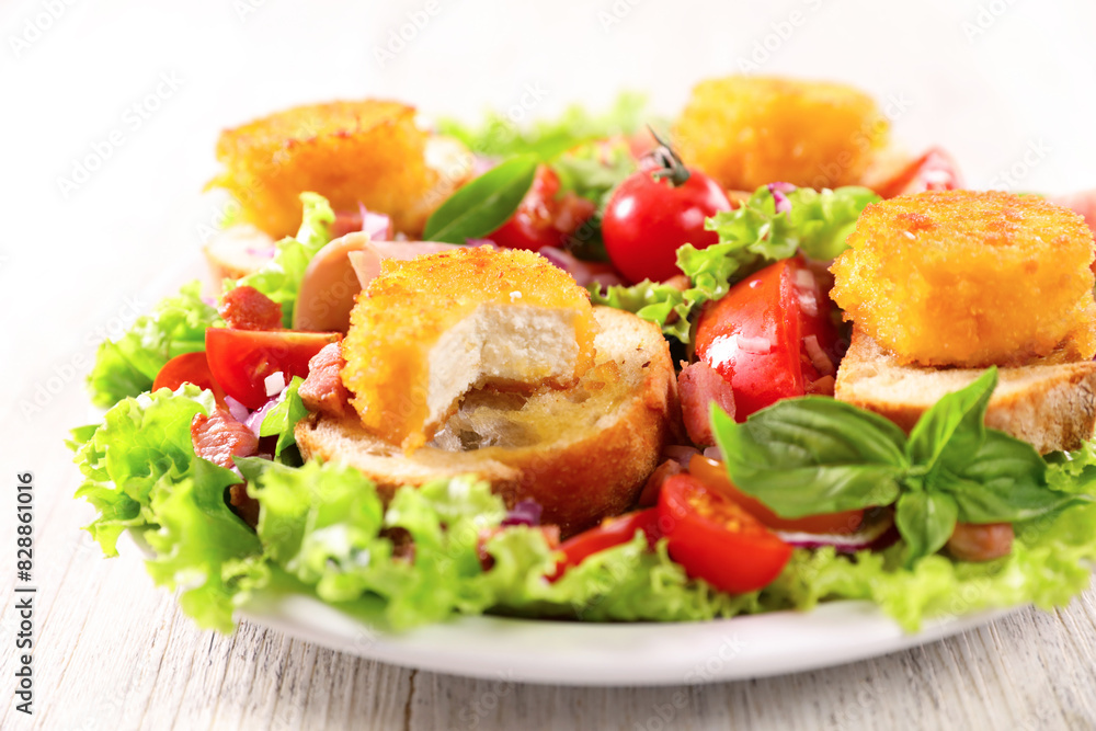 salad with bread toast and fried goat cheese salad with bread toast and fried goat cheese