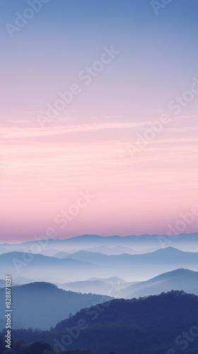 3d rendering of  A serene view of layered mountains at sunrise with pastel colors and a foggy atmosphere, epitomizing tranquility and natural beauty. © tohceenilas