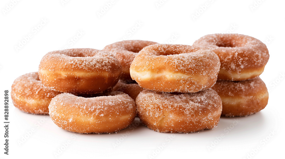 Front view of sugar-glazed cinnamon donuts in a stack, isolated on a white background with clipping path Front view of sugar-glazed cinnamon donuts in a stack, isolated on a white background with clipping path