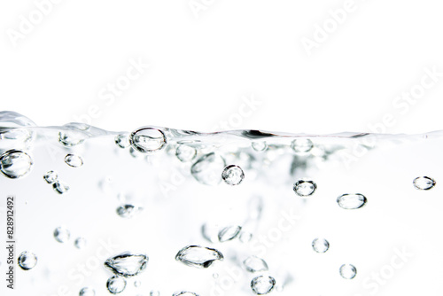 Air bubbles and clear water surface.